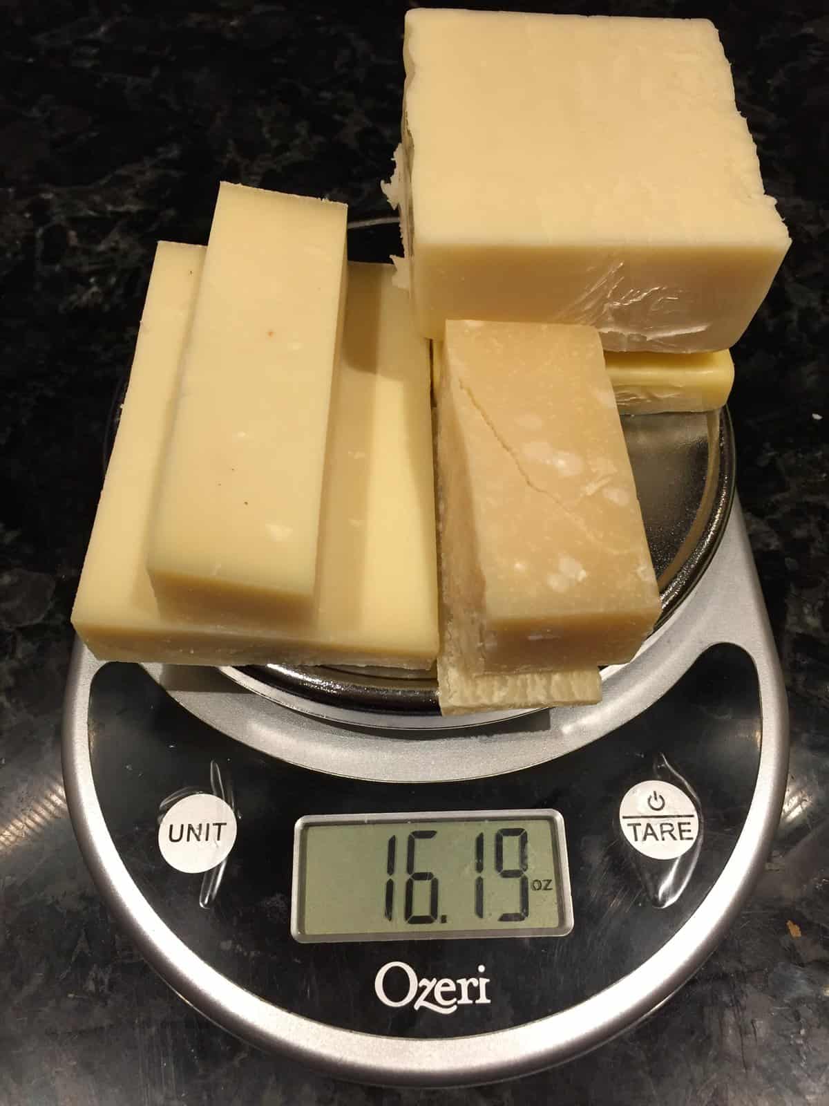 pound of cheese on a scale.