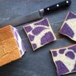 slices of bread in a purple cow pattern.