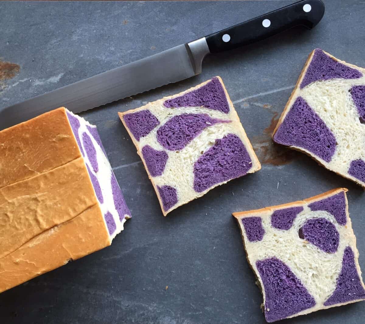 slices of bread in a purple cow pattern.