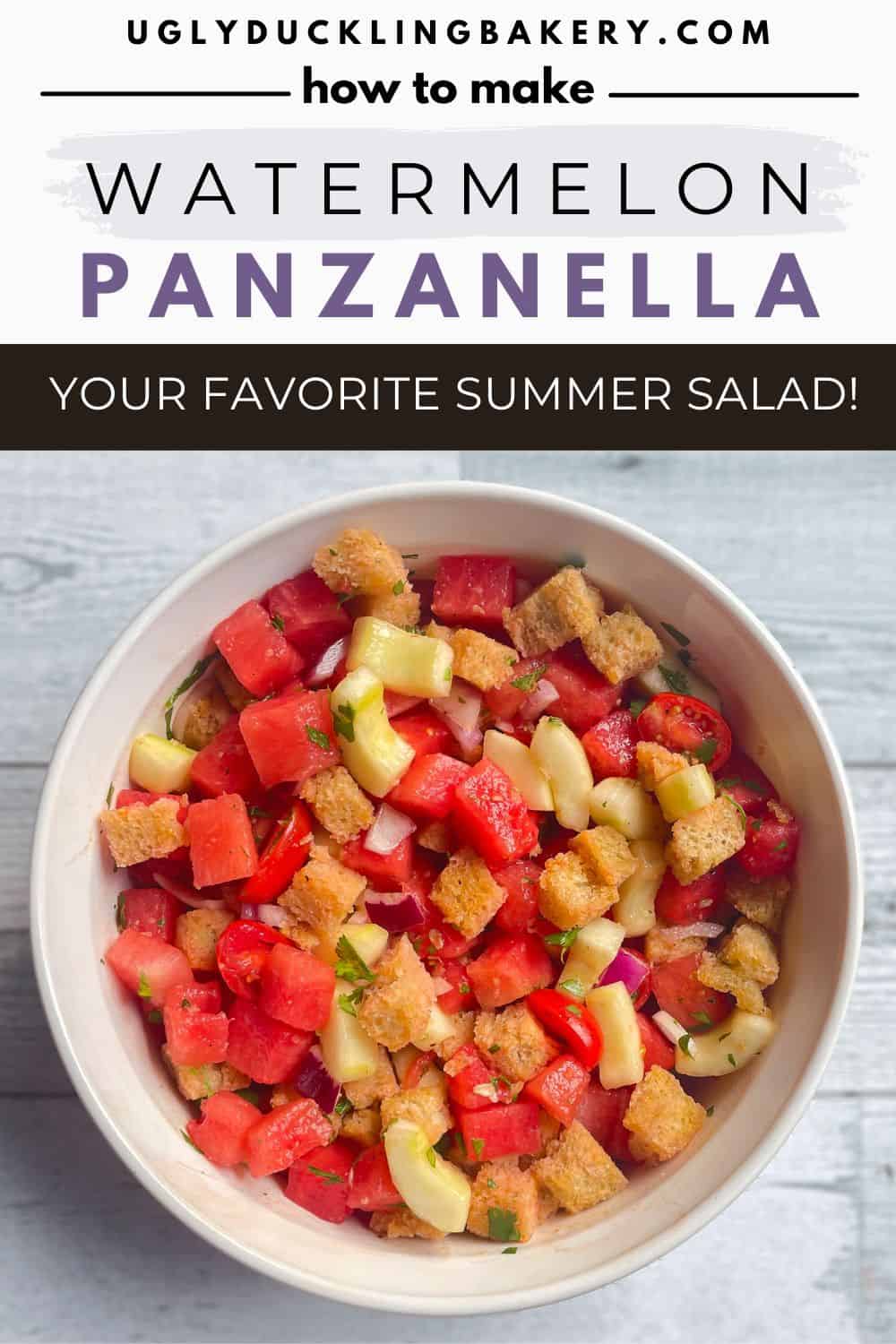 bread salad with chunks of watermelon, croutons, tomato, cucumber, and herbs.