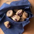 a basket of oatmeal blackberry muffins.