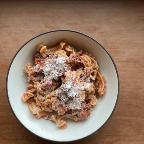 a bowl of sausage ragu with cascatelli.