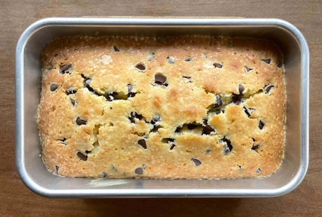 baked chocolate chip pound cake in a loaf pan.
