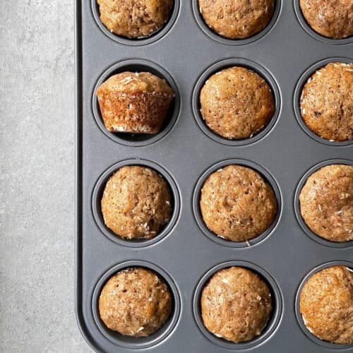 a tray of mini banana muffins with coconut