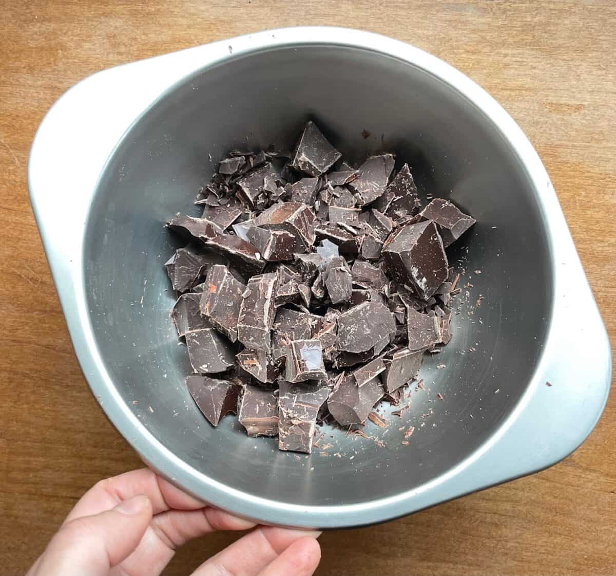 double boiler insert with chopped chocolate.