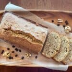 a coffee and walnut loaf and three cake slices.