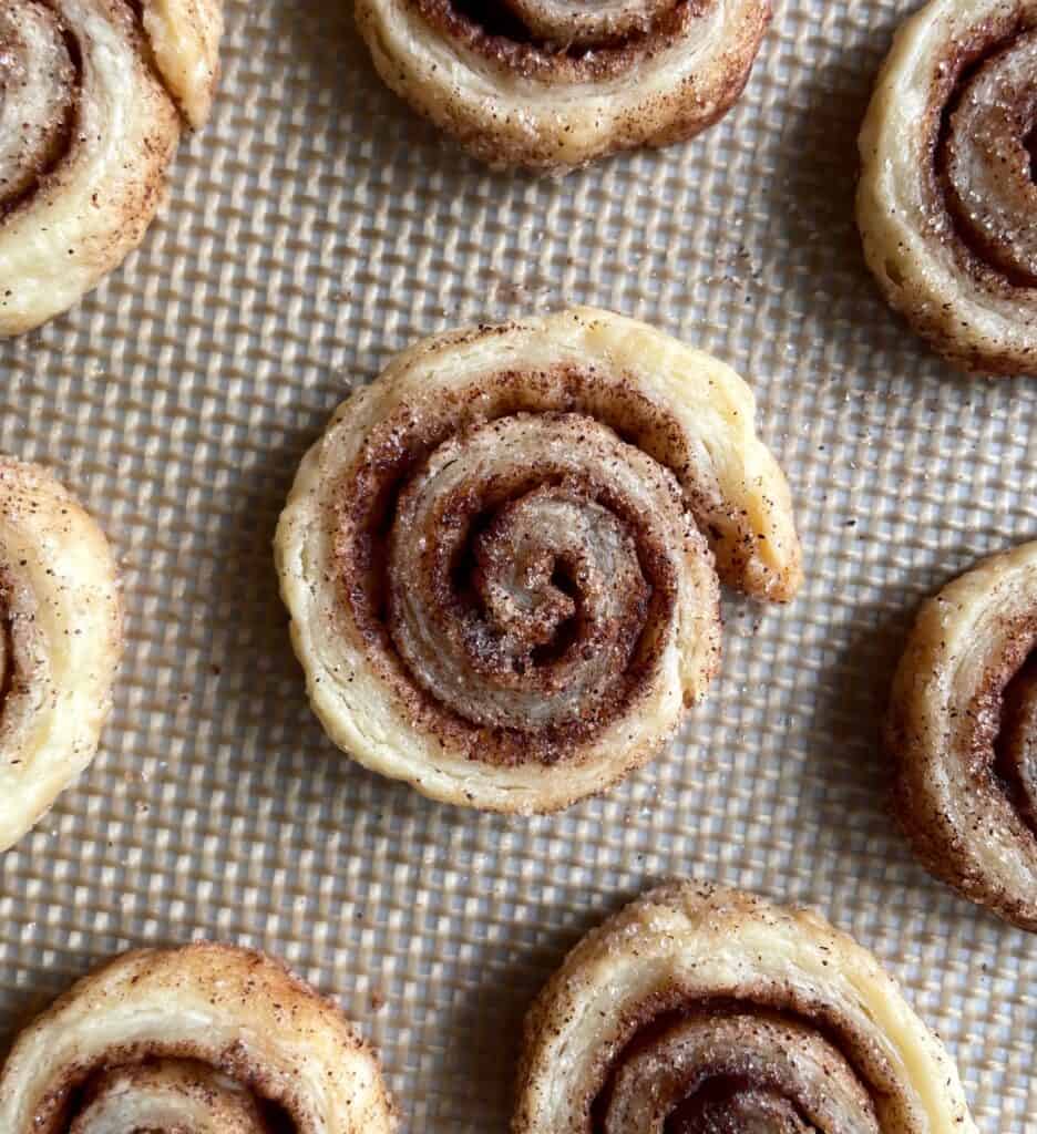 cinnamon sugar pie crust cookies on a baking sheet.