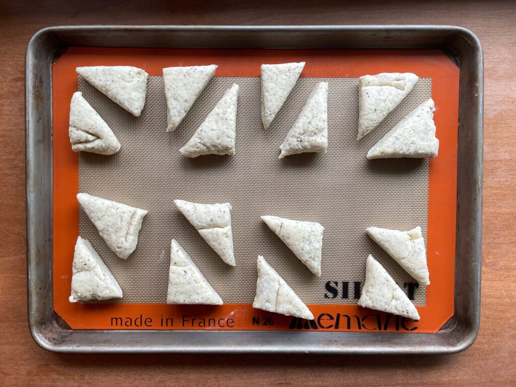 cut earl grey scones on a baking sheet.