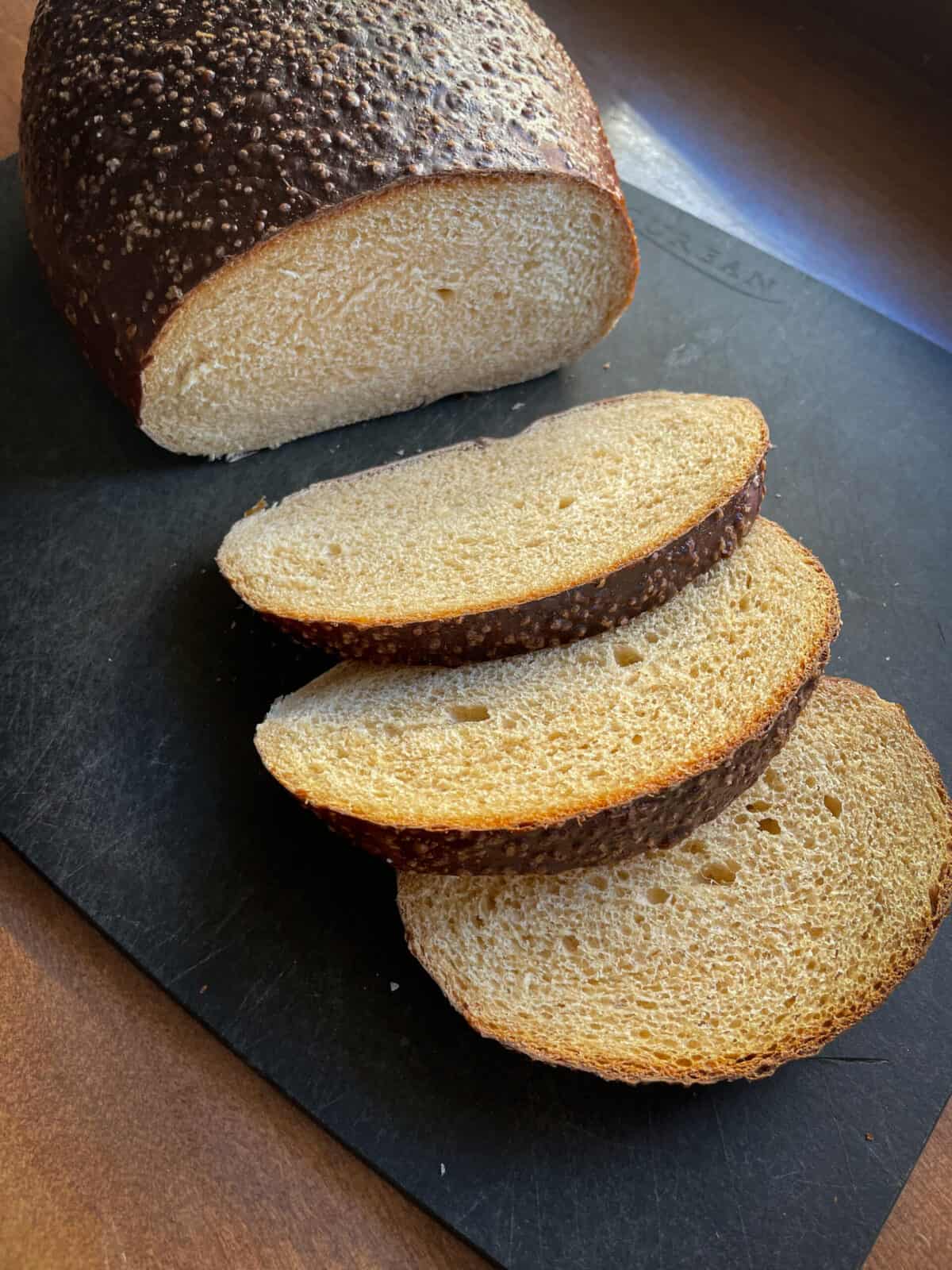 free-standing loaf of pretzel bread made with lye and cut into three slices.