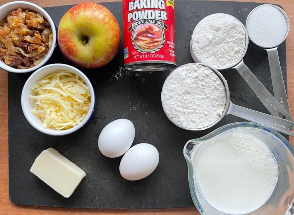 ingredients for making the apple waffles laid out on a cutting board.