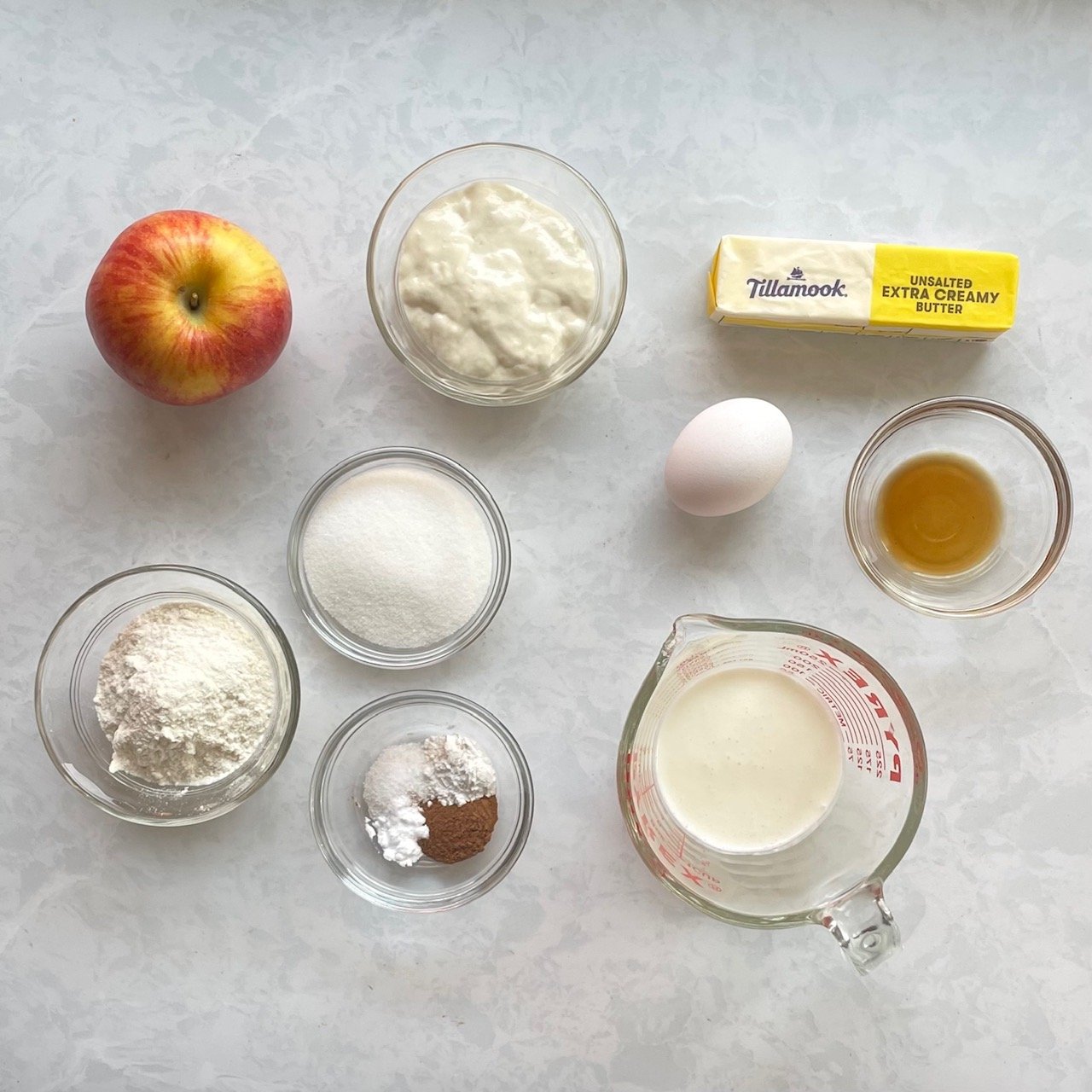 apple, sourdough discard, butter, sugar, flour, egg, buttermilk, vanilla, and spices.