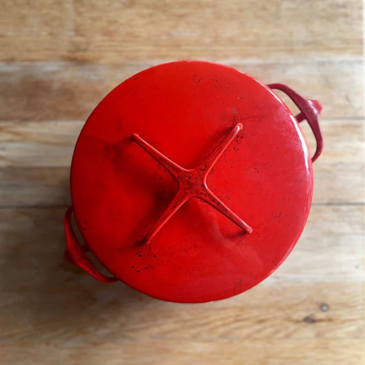 red lidded Dutch oven.
