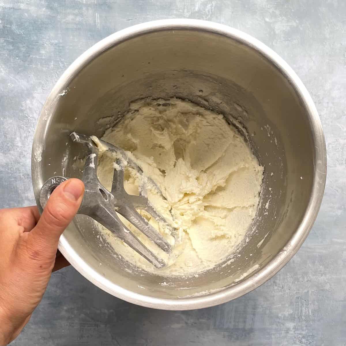 mixing bowl with creamed butter and sugar.