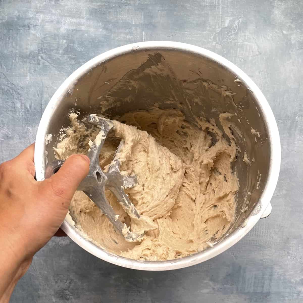 maple doughnut cake batter in a mixing bowl.