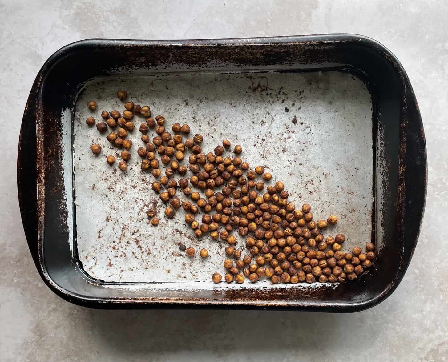 baking pan with roasted spiced chickpeas.