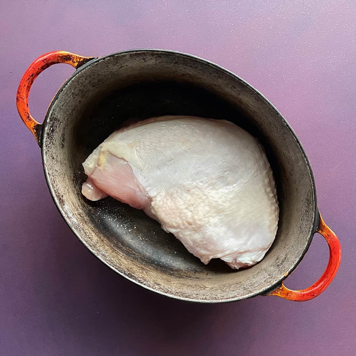 boneless turkey breast in a Dutch oven.