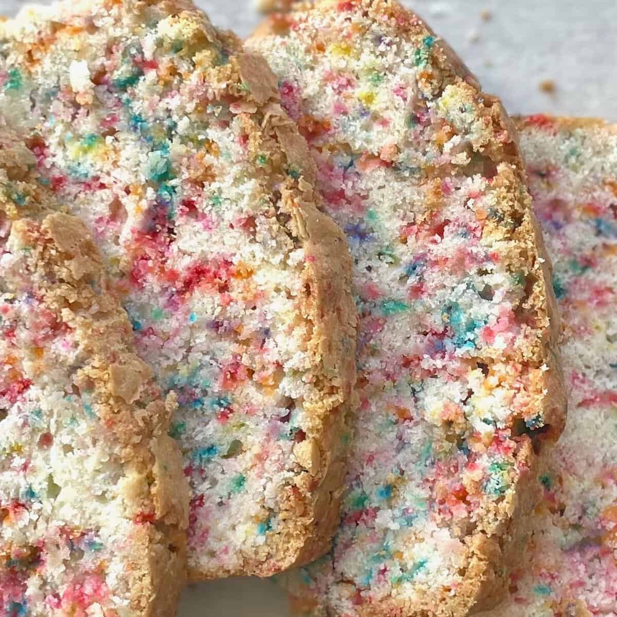 four slices of unglazed funfetti pound cake.