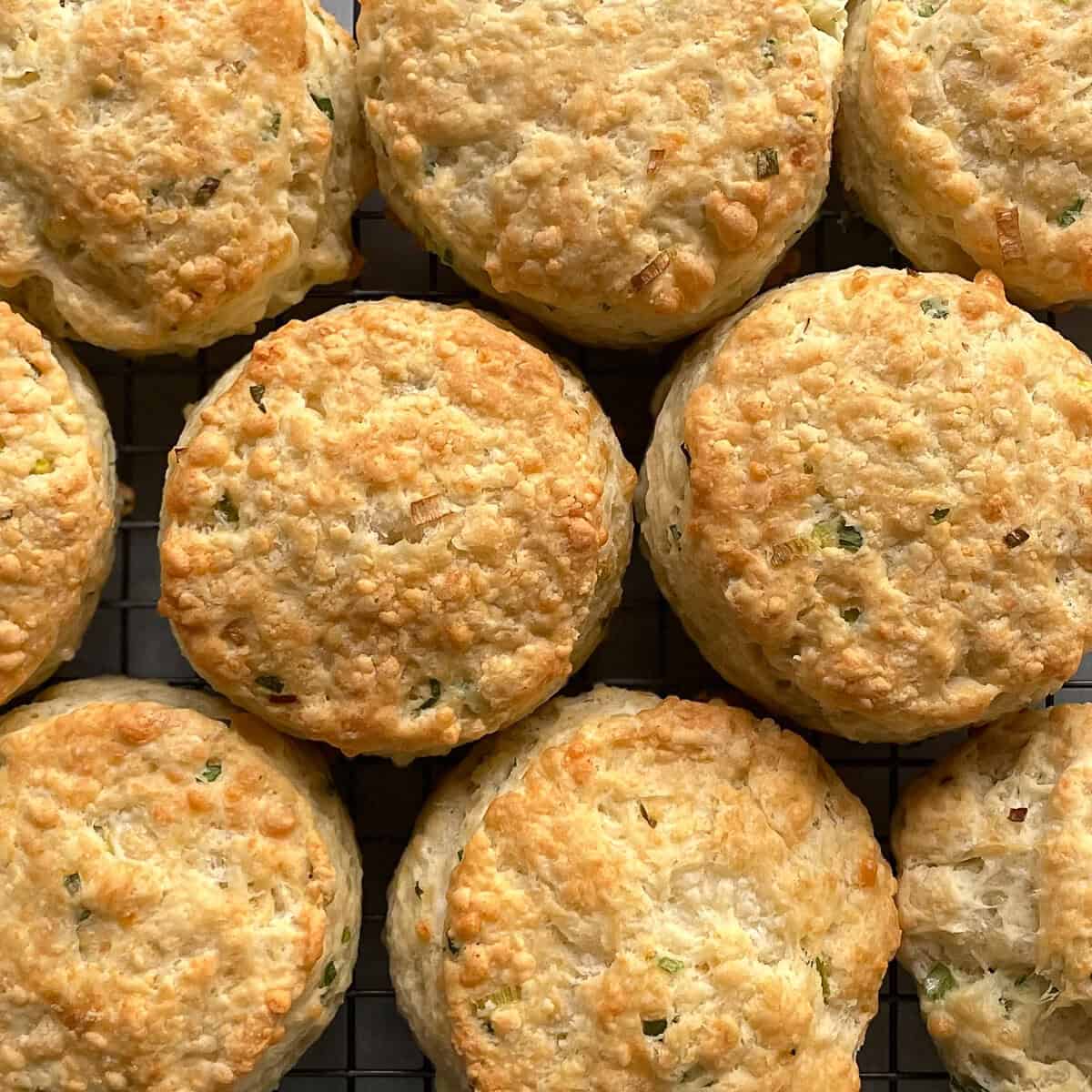 cheddar biscuits on a cooling rack.