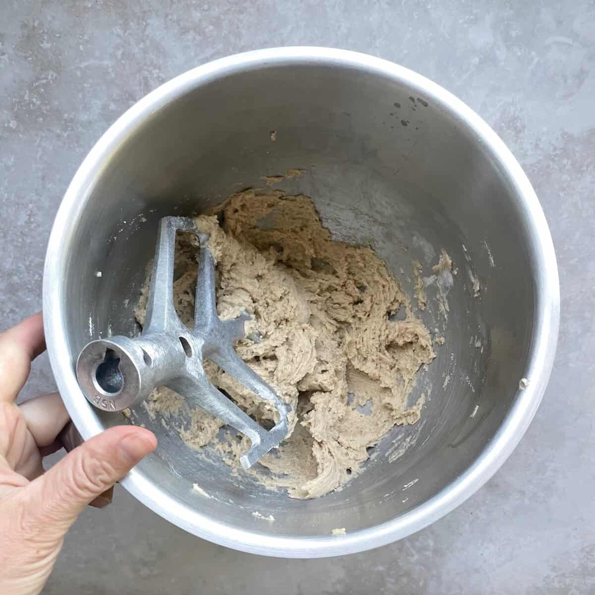 thick cookie batter in a mixing bowl.