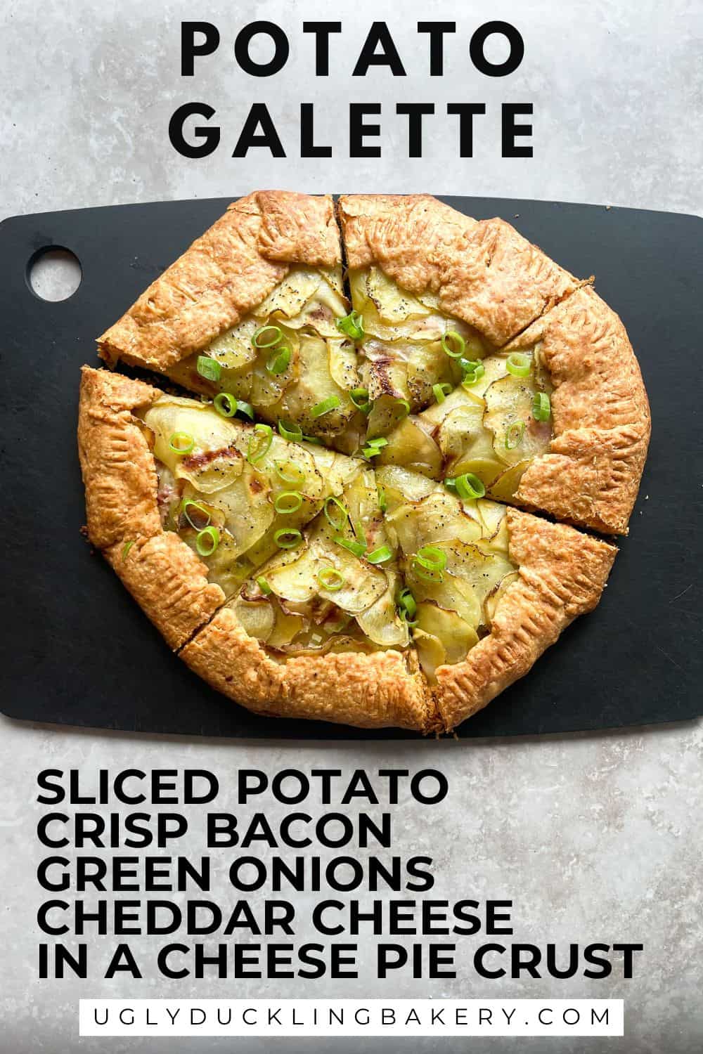 potato galette with bacon and green onions cut into six wedges on a cutting board.