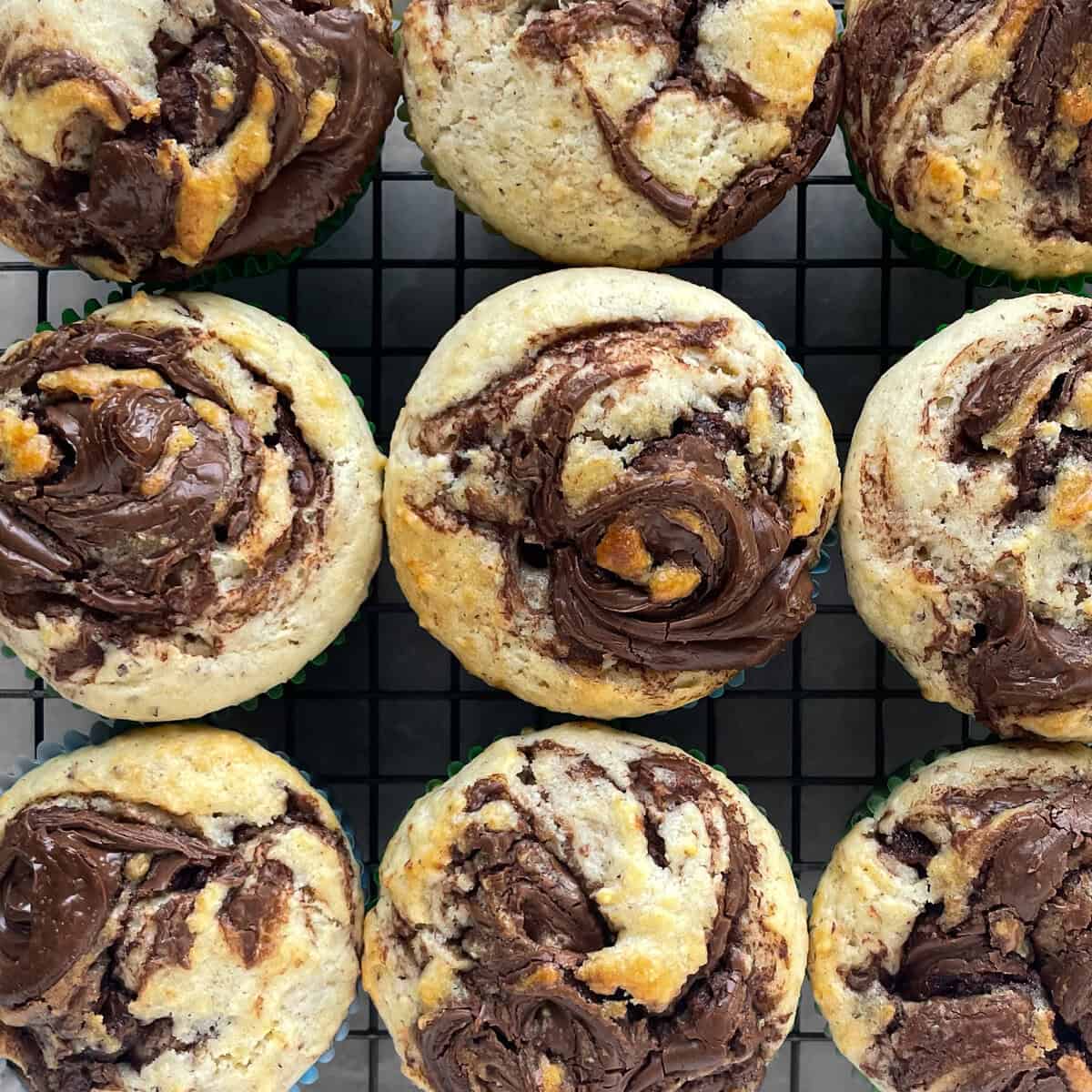 Nine Nutella swirl muffins.